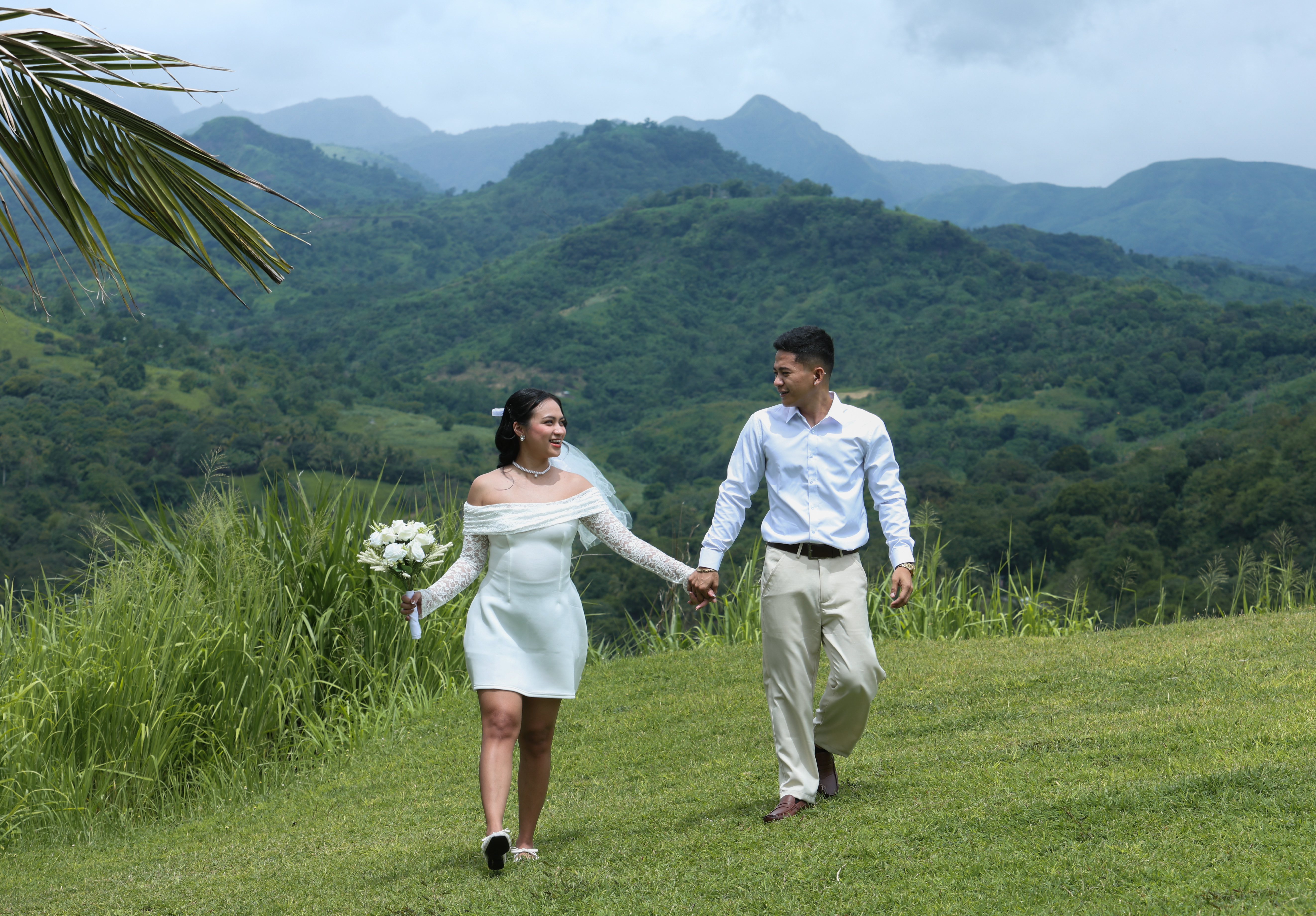 SJ and Emery walking in the mountains